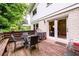 Outdoor deck with dining furniture, perfect for enjoying al fresco meals and outdoor relaxation at 2804 Dunnington Cir, Chamblee, GA 30341