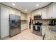 Spacious kitchen with stainless steel appliances and ample cabinet storage at 2804 Dunnington Cir, Chamblee, GA 30341