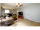 Spacious carpeted living room with fireplace and ceiling fans at 2804 Dunnington Cir, Chamblee, GA 30341
