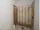 Unfinished bathroom framing showcases the shower area, providing a blank canvas for a custom design at 452 Maypop Ln, Woodstock, GA 30188
