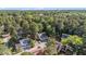 Areal view of townhome community surrounded by lush, mature trees at 82 Twiggs Cor, Peachtree City, GA 30269