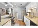 Updated kitchen featuring granite countertops, stainless steel appliances, and ample cabinet space at 82 Twiggs Cor, Peachtree City, GA 30269