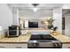 Open kitchen design featuring granite countertops, stainless steel appliances, and a breakfast bar at 82 Twiggs Cor, Peachtree City, GA 30269