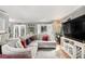 Inviting living room with hardwood floors, ample natural light, and an open layout, perfect for entertaining guests at 82 Twiggs Cor, Peachtree City, GA 30269
