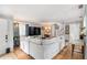 Spacious living room with hardwood floors, natural light, and a staircase, perfect for entertaining at 82 Twiggs Cor, Peachtree City, GA 30269