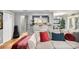 Cozy living room with hardwood floors, a breakfast bar, and access to the kitchen, perfect for Gathering gatherings at 82 Twiggs Cor, Peachtree City, GA 30269