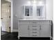 Bathroom vanity featuring double sinks, marble countertop, and white cabinets at 106 Adair Ave, Atlanta, GA 30315