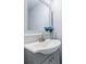 Close-up of sink featuring stainless faucet and clean white porcelain basin at 106 Adair Ave, Atlanta, GA 30315