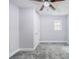 Bedroom with fresh paint, natural light, and a ceiling fan, providing a simple and comfortable living space at 106 Adair Ave, Atlanta, GA 30315