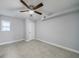 Bright bedroom with ceiling fan, natural light from the window, and fresh, neutral decor for a calming atmosphere at 106 Adair Ave, Atlanta, GA 30315