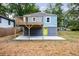 The backyard has a porch and deck to sit and enjoy the outdoors at 106 Adair Ave, Atlanta, GA 30315