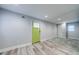 The spacious living room offers new paint and new flooring at 106 Adair Ave, Atlanta, GA 30315