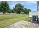Expansive backyard featuring lush green grass and a concrete patio, perfect for outdoor enjoyment at 2555 Flat Shoals Rd # 801, Atlanta, GA 30349
