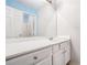 Bathroom featuring a large mirror, a long vanity, and white cabinets at 2555 Flat Shoals Rd # 801, Atlanta, GA 30349