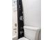 Bathroom showcasing a shower-tub combination with dark shower curtain and a white toilet at 2555 Flat Shoals Rd # 801, Atlanta, GA 30349