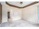 Spacious carpeted bedroom with tray ceiling at 2555 Flat Shoals Rd # 801, Atlanta, GA 30349