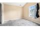 Bedroom with neutral walls and large window at 2555 Flat Shoals Rd # 801, Atlanta, GA 30349