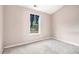 Small bedroom with neutral walls at 2555 Flat Shoals Rd # 801, Atlanta, GA 30349