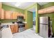 Traditional kitchen with stainless steel appliances and white countertops at 2555 Flat Shoals Rd # 801, Atlanta, GA 30349