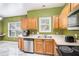 Well-lit kitchen featuring stainless steel appliances and marble floors at 2555 Flat Shoals Rd # 801, Atlanta, GA 30349