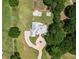Expansive estate aerial view featuring a circular driveway, pool, garden, and lush landscaping at 3030 Berry Rd, Loganville, GA 30052