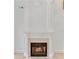 Stone fireplace featuring a mantle, hearth, and decorative moulding at 3030 Berry Rd, Loganville, GA 30052
