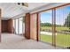 View from indoor brick patio showing pool, and outdoor grassy space at 3030 Berry Rd, Loganville, GA 30052