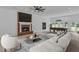 Spacious recreation room with a fireplace, billiard table, and comfortable lounge area at 3030 Berry Rd, Loganville, GA 30052