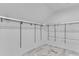 A bright walk-in closet featuring wire shelving and ample storage space at 3030 Berry Rd, Loganville, GA 30052