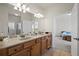 Bathroom featuring a double sink vanity with granite countertops at 329 Acuba Vw, Woodstock, GA 30188