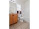 Well-lit bathroom with a modern vanity, tiled floor, and a shower-tub combination at 329 Acuba Vw, Woodstock, GA 30188
