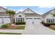 Charming cottage-style home with a well-manicured front yard and a two-car garage at 329 Acuba Vw, Woodstock, GA 30188