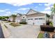 Well-maintained home with a two-car garage, beautiful landscaping and inviting curb appeal at 329 Acuba Vw, Woodstock, GA 30188