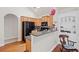 Well-lit kitchen featuring granite countertops, stainless steel appliances, and ample cabinet space at 329 Acuba Vw, Woodstock, GA 30188