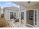 Cozy outdoor patio area perfect for dining with access to the home's interior at 329 Acuba Vw, Woodstock, GA 30188