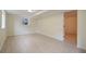 Spacious basement featuring sleek flooring and access to additional rooms at 8432 Magnolia Dr, Jonesboro, GA 30238