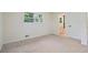 Cozy bedroom with soft carpet and ample natural light at 8432 Magnolia Dr, Jonesboro, GA 30238