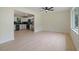 Bright living room featuring new flooring, and an open floor plan to the kitchen area at 8432 Magnolia Dr, Jonesboro, GA 30238