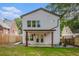Exterior view of a home with a well-maintained yard and patio with support columns at 1721 S Gordon Sw St, Atlanta, GA 30310
