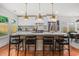 Stylish kitchen features a large island with seating, modern appliances, and hardwood floors at 1721 S Gordon Sw St, Atlanta, GA 30310