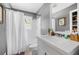 Well-lit bathroom with a tub/shower and updated vanity at 3770 Ponderosa Ln, Powder Springs, GA 30127
