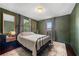 Bedroom with hardwood floors, neutral-toned walls, natural light, and stylish decor at 3770 Ponderosa Ln, Powder Springs, GA 30127
