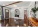 Entry foyer featuring gleaming hardwood floors and classic details at 3770 Ponderosa Ln, Powder Springs, GA 30127