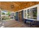 Cozy front porch with wood ceiling and chairs at 3770 Ponderosa Ln, Powder Springs, GA 30127