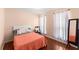Cozy bedroom with hardwood floors and natural light offers a relaxing atmosphere for sleep and rest at 4303 Anderson Ridge Dr, Austell, GA 30106