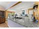 Modern kitchen featuring granite countertops, white cabinetry, new appliances, and hardwood floors at 4303 Anderson Ridge Dr, Austell, GA 30106