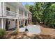 Covered patio space with basketball hoop and view of the upper level deck at 4495 Westgate Dr, Cumming, GA 30040