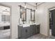 Elegant bathroom with a double vanity, shiplap walls, and access to the main bedroom at 4495 Westgate Dr, Cumming, GA 30040