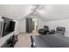 Bonus room with vaulted ceiling, carpet, media center and two leather chairs at 4495 Westgate Dr, Cumming, GA 30040