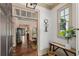 Inviting foyer with hardwood floors and view to the dining room at 4495 Westgate Dr, Cumming, GA 30040